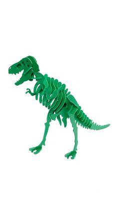 a green plastic dinosaur toy on a white background