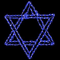 the star of david is lit up with blue lights