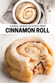 cinnamon roll is cut in half and sitting next to a bowl with the top rolled up