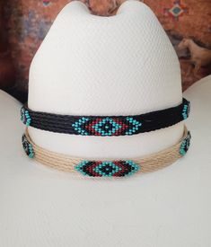 Braided Horse Hair Adjustable Hat Band with Native American Indian Style Beading and 2 Tassels with a sliding knot that make this hatband a great fit for most hats. Available in Black or White Horse hair.  This stunning hat band is made from genuine braided horse hair and will compliment your favorite cowboy hat.   -  3 braided strands are sewn together to create this gorgeous hatband. - Native American Indian style beadwork - Incudes 2 horse hair tassels that measure 3 1/4" long - Hat band measurements: approximately adjusts from  21" to 29" around and is 3/8 inch wide - Hat bands are shown on a size 7 hat.  Hats are not included. - See my horse hair KEEPSAKES to have a hat band made from your horse's hair:  https://www.etsy.com/shop/BlueEyesDesignsHB?ref=seller-platform-mcnav§ion_id=4369 Adjustable Beaded Bohemian Headband, Adjustable Bohemian Beaded Headband, Handmade Adjustable Headband For The Beach, Bohemian Adjustable Headband Hat, Adjustable Beaded Headband, Adjustable Black Handmade Headband, Adjustable Hat Band With Bead Caps For Festival, Adjustable Bead Cap Hat Bands For Festival, Traditional Beaded Adjustable Hat