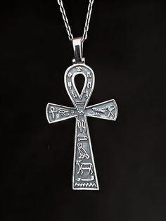 "Key of Life Ankh Necklace-Sterling Silver Ancient Egyptian Amulet-Hieroglyphic Ankh Necklace-Mythological Jewelry-Handmade Ankh Necklace-Ancient Jewelry-Ancient Egypt Necklace-Charm Jewelry- Valentine's Day Gift-Gift-Gift To Her-Gift To Him-Birthday Gift-Gift For Mom-Christmas Gift -New Year Gift- Ankh symbol Egyptian; It is the \"cross of life\", symbolizes the union of men and women, and treats it as the attraction of universal life. Also known as the key of the Nile. Our product is meticulou Symbolic Etched Jewelry For Blessing, Silver Ankh Necklace For Ceremonial Use, Silver Ankh Necklace For Ceremonial Occasions, Silver Ankh Jewelry For Anniversary, Antique Silver Jewelry For Blessing, Sterling Silver Ankh Engraved Jewelry, Symbolic Engraved Ankh Jewelry, Antique Ankh Jewelry As Gift, Antique Ankh Jewelry Gift