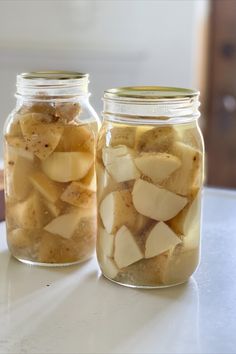 Chopped potatoes in jars of water that have been pressure canned. Pressure Canning Potatoes Raw Pack, Canning Sweet Potatoes Raw Pack, Raw Pack Canning Potatoes, Canning Potatoes With Skin On, Dry Canning Potatoes Water Bath, Dry Pack Canning Potatoes, Canning New Potatoes, Canning Russet Potatoes, Dry Canning Potatoes Pressure Cooker