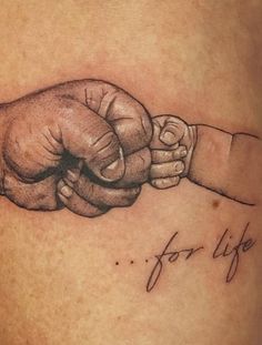 two hands holding each other with the word for life written on it in cursive writing