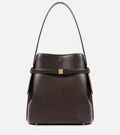 Leather bucket bag in brown - Toteme | Mytheresa High-end Travel Bucket Bag, High-end Bucket Bag With Detachable Strap, High-end Bucket Bag Tote With Detachable Strap, High-end Bucket Bag Satchel With Detachable Strap, High-end Bucket Bag With Detachable Strap Satchel, High-end Bucket Satchel With Detachable Handle, High-end Satchel With Bucket Shape And Detachable Handle, High-end Bucket Bag With Detachable Strap And Double Handle, High-end Leather Bucket Bag