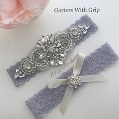 EXCLUSIVE:  Wedding Garter, Bridal Garter, Wedding Garter Belt, Garters for wedding, Wedding Garter Gray, Wedding Garters, Gray Wedding GarterThis gorgeous wedding garter set is made of high end materials and beautifully adorned with handcrafted jewels and faux pearls. The jeweled applique is available in silver, gold and rose gold while the lace is available in various colors! This set has unique anti-slip properties which will ensure a secure and snug fit. The drop down menu offers the set to Silver Fitted Bridal Accessories, Adjustable Lace Bridal Accessories For Wedding, Silver Lace Bridal Accessories For Wedding, White Bridal Sets, Garters For Wedding, Bridal Hair Veil, Garter Wedding, Something Blue Bridal, Gray Wedding