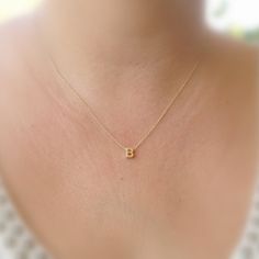 Gold Initial Necklace - make someone happy with this cute simple initial necklace. Sooo sweet! tiny little gold filled letter bead on 14k gold filled dainty chain.It is so cute! you will definitely love it :)A petite tiny 5 mm gold filled letter bead necklace.Simple, beautiful and chic jewelry.Necklace Measures Approximately 17"Please specify your letter If you would like this chain altered, please convo me. All my jewelry are packed in an elegant gift box.If you want to give it as a gift you can specify the address and I'll be happy to send it on your behalf.