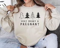 Product: Merry And Pregnant Sweatshirt, Very Merry and Pregnant Sweatshirt, Christmas Pregnancy Announcement, Pregnancy Announcement Sweatshirt ✦ MAKE IT PERFECT and Customize this shirt for FREE! Just shoot us a message BEFORE purchasing and we will work with you to create a design you'll love. ✦ SIZING CHART Please refer to the sizing chart in the pictures above to find your perfect fit! Simply lay your favorite T-shirt flat and measure armpit to armpit then compare it to the size chart image Christmas Pregnancy Announcement, Christmas Pregnancy, Pregnancy Announcement, Sweat Shirt, Halloween Shopping, Perfect Fit, Favorite Outfit, Cotton Fabric, Gender Neutral