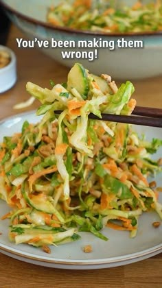 there is a salad with carrots and lettuce on the plate that says you've been making them wrong