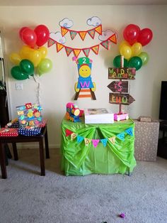 a birthday party with balloons and decorations