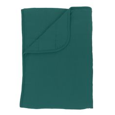 the teal green blanket is folded up