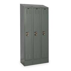 a gray metal locker with two doors