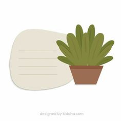 a potted plant sitting next to a blank paper