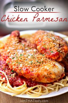 slow cooker chicken parmesan on a plate with spaghetti