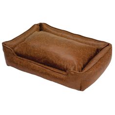 a brown leather dog bed with a square shaped pillow on the front and back sides