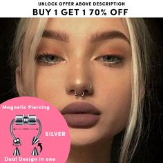 a woman with piercings on her nose has an ad for silver in front of her