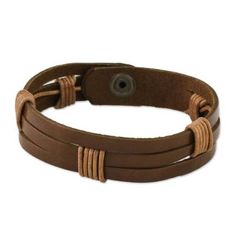 Chaloemphon of Thailand presents this men's leather wristband bracelet. The light brown leather has three horizontal slits. The artisan has wrapped two sections in black leather cord in artful intervals adding to the bracelet's texture and visual impact. The bracelet closes with a brass snap. Leather Wristbands, Wristband Bracelet, Light Brown Leather, Fabric Bags, Leather Shops, Handcrafted Leather, Jewelry Packaging, Jewelry Gift Box, Leather Cord