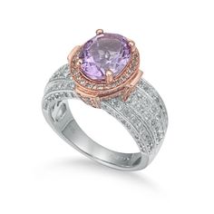 This beautiful oval-cut birthstone ring from Suzy Levian features a 2.55 carat purple amethyst center stone, accentuated by 198 pave set white topaz gemstones. This ring is crafted of sterling silver with a high polish. This magnificent two-tone rose and sterling silver finish highlights the marvelous purple amethyst center stone. This ring is designed by Suzy Levian with a message. By creating jewelry that is beautiful inside and out, Suzy Levian's message is revealed through a hidden white top Silver Halo Ring, Gemstone Brooch, Purple Amethyst Ring, Cubic Zirconia Bracelet, Cubic Zirconia Jewelry, Jewelry Rings Diamond, Pink Amethyst, Gemstone Necklace Pendant, Pink Ring