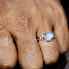 Natural Moonstone Ring, Moonstone Silver Ring, Rainbow Moonstone Ring, 925 Silver Ring, Handmade Ring, June Birthstone Ring, Dainty Ring, Metal: 925 Sterling Silver Gemstone : Moonstone Stone Color : Blue Stone Shape : Round Stone Setting: Bezel Benefits of wearing Blue Turquoise:- The Blue Turquoise can help you strike the right balance in your emotional state too, by being an efficient healer and ensuring the well-being of your body and mind. Holding or wearing this gemstone can also restore y Mystical Style Moonstone Ring With Natural Stones, Spiritual Moonstone Promise Ring Stamped 925, Spiritual Moonstone Ring Stamped 925, Spiritual Round Moonstone Ring, Spiritual Sterling Silver Moonstone Ring With Moon Phase, Spiritual Sterling Silver Moonstone Ring, Moon Shaped Sterling Silver Opal Ring, Moon Shaped Opal Ring In Sterling Silver, One-of-a-kind Oval Moonstone Ring In Sterling Silver