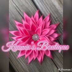 This is a beautiful hand made pink kanzashi flower brooch. The flower is made out of satin fabric and has a pink jewel embellishment in the middle. It measures at 8 inches. It is sitting on felt and placed on a bar pin. This flower brooch is great for any occasion and will add that special something to any outfit. This brooch would be great for weddings, church and makes a great gift. This item ships in 3 to 5 business day. Contact me with special orders. Pink Wedding Brooch With Flower Decoration, Pink Flower Brooch For Wedding, Pink Flower Decoration Brooches For Party, Pink Party Brooch With Flower Decoration, Pink Party Brooches With Flower Decoration, Pink Flower Brooch For Gift, Handmade Pink Flower Brooches, Corsage Pink, Pink Brooch