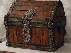 an old wooden chest with a cross on it