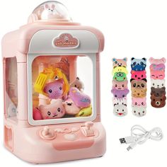 a pink toy machine with stuffed animals in it