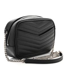 This is an authentic SAINT LAURENT Grain De Poudre Matelasse Monogram Mini Lou Camera Bag in Black. This elegant shoulder bag is crafted of beautiful chevron-quilted calfskin leather in black. The bag features a silver chain link shoulder strap, and a matching silver YSL monogram detail on the front. The tasseled wrap-around zipper opens to a compact black leather interior with card slots. Leather Interior, Chain Link, Camera Bag, Card Slots, Calf Skin, Silver Chain, Slots, Saint Laurent, Grain