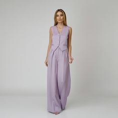 Introducing our Lylia Silk Crepe Pants, a statement of luxurious comfort and timeless style. Tailored from lavender silk crepe with a wide-leg cut, they feature expertly placed darts that contour the waist and flatter the silhouette. The pressed crease detail offers a touch of refinement, elevating the overall look with understated polish. A concealed zipper and hook fastening in the front ensures a seamless finish, while the inclusion of pockets adds a practical yet chic element to the ensemble.  Match: Complete the ensemble with the Lylia Silk Crepe Vest.  Each Il Volo item is designed with utmost care and produced in limited series, ensuring the highest standard of craftsmanship. 100% Italian Double Silk Satin.  Gentle dry clean. Do not wash. Do not use chlorine based bleach. Do not tum Crepe Pants, Lavender Silk, August Birthstone Jewelry, July Birthstone Jewelry, Gifts For New Mums, Jewelry Ring Box, Pearl Jewellery Earrings, Natural Silk, August Birth Stone