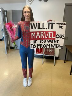 a girl dressed as spider - man holding flowers and a sign that says will it be marvelous if you went to from within?