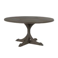 an image of a table that is in the shape of a round dining room table