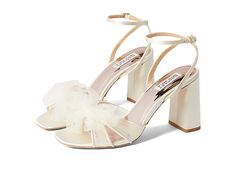 Badgley Mischka Tess - Women's Shoes : Ivory : Accented with a whimsical tulle bow on the vamp and lifted by an elegant block heel, the Badgley Mischka Tess Heels are enough to take your dressy style to new heights. Textile upper. Man-made lining and insole. Adjustable buckle strap closure on the ankle. Open square toe. Leather outsole. Imported. Measurements: Heel Height: 3 3 4 in Weight: 10 oz Product measurements were taken using size 9, width M. Please note that measurements may vary by size Spring Wedding Shoes With Bow And Block Heel, Spring Prom Block Heels With Heel Strap, Chic Block Heels For Prom In Spring, Bow Heels For Spring Wedding, Elegant Bow Block Heels For Spring, Elegant Spring Block Heels With Bow, Spring Wedding Heels With Bow, Formal Bow Straps Block Heels, Elegant Formal Tulle Heels