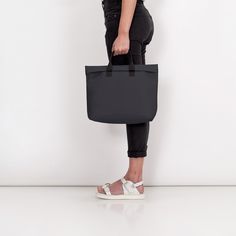 This versatile accessory seamlessly transitions between a handbag and a backpack, offering flexible usage. The closure is secured with a discreet hidden zipper, maintaining a sleek and modern aesthetic. Inside, there's an internal zip pocket designed to accommodate essentials such as a wallet, cell phone, or keys. The handle connection features a stable cross seam for durability. The adjustable shoulder straps enhance comfort and adaptability, allowing for a personalized fit. Adding to its appea Modern On-the-go Backpack Shoulder Bag, Standard Backpack With Laptop Sleeve For On-the-go, Versatile Laptop Bag With Sleeve Backpack, Versatile Laptop Backpack With Sleeve, Versatile Laptop Bag With Sleeve In Standard Backpack Style, Modern Satchel Briefcase For On-the-go, Versatile Backpack With Laptop Sleeve For On-the-go, Versatile Daily Backpack With Laptop Sleeve, Versatile Daily Use Backpack With Laptop Sleeve