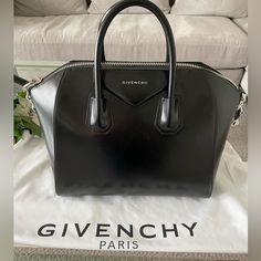 Brand New Givenchy Black Antigona Medium Brand New With Tags And Authenticity Cards. Perfect For Traveling! Givenchy Bags, Givenchy Bag, Patent Leather Handbags, Juicy Couture Charms, Vintage Shoulder Bag, Nylon Tote Bags, Leather Clutch Bags, Nylon Tote, Makeup Pouch