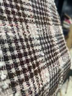 A medium-weight, tight-weaved Boucle with threads of pink and metallic threads woven through. We are unable to offer refunds on cut fabrics X6607 Metallic Thread, Medium Weight, Tights, Cream, Pink, Fabric