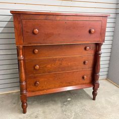 Beautifully crafted Empire style solid cherry wood chest of drawers. Dovetail joints, turned legs and drawer pulls. Amazing aged patina. In classic empire style, the top drawer is the largest and deepest. Highly carved posts on the dresser and 4 large, smoothly opening dovetailed drawers. In good antique condition. Pretty keyholes in Drawers.  Matching nightstand available in another listing. Vintage Chest Of Drawers Dresser, Log Home Bedroom, 3 Drawer Antique Dresser, Empire Dresser, Dresser 1940 Charm, Cherry Dresser, 4 Drawer Antique Chest Of Drawers, Matching Nightstands, Wood Chest