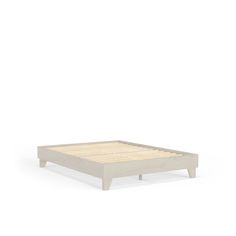 a white bed frame with wooden slats on the bottom and sides, against a white background