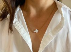 Before placing an order please check the estimated shipping times. If you need your order in a hurry shipping upgrades are available. Thank you. This simple cross necklace is just perfect for wearing on its own or layered with your favourite pieces! D E T A I L S *It features a mother of pearl cross pendant measuring 16 x 12.5mm. (Each of these varies slightly in shape as they are made from natural shell and may not be perfectly symmetrical.) *It has been wire wrapped using gold filled wire to a Dainty White Cross Necklace, White Cross Necklace For Everyday, Everyday White Cross Necklace, Simple Cross Necklace, Cross Necklace Simple, Pearl Cross Necklace, Dainty Cross Necklace, Simple Cross, Layering Necklace