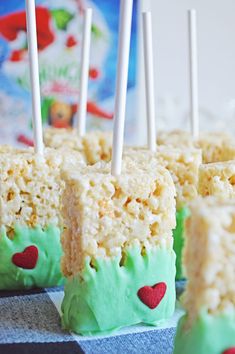 rice krispy treats with green frosting and hearts on them