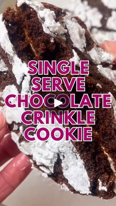 a person holding a chocolate crinkle cookie in their hand with the words single serve chocolate crinkle cookie above it