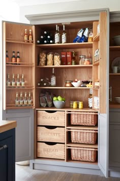 an open pantry filled with lots of food and drinks