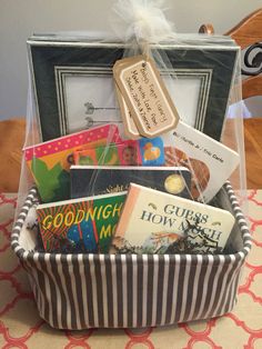 a basket filled with books sitting on top of a table