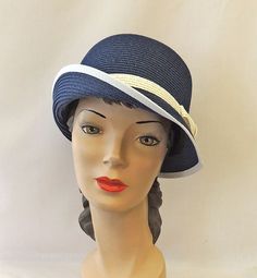 Vintage style 1920s 1930s  Cloche  Summer Hat  Blue and white  colour Paper Raffia Cloche Hat One size inside circumference is 23 inches ( Adjustable  inside ) The brim measurers 1 inch at the back and 2.5 inches at the front Brand new Vintage Blue Adjustable Hat Bands, Retro Adjustable Cloche Hat For Summer, Retro Wide Brim Blue Hat, Blue Brimmed Cloche Hat For Summer, Blue Fitted Wide Brim Cloche Hat, Blue Adjustable Cloche Hat, Blue Wide Brim Cloche Hat, Adjustable Blue Cloche Hat, Fitted Blue Straw Hat With Short Brim