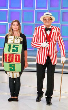 a man and woman dressed up in costumes on the set of tv show celebritys