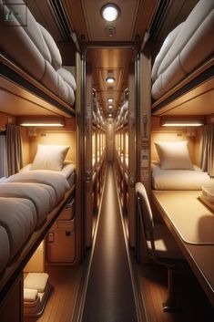 the inside of a train car with bunk beds and pillows on each side, along with windows