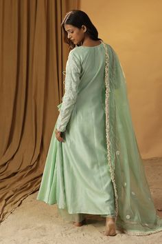 Pista green angarkha with dori work, sequins and cowrie shells embroidery. Paired with lace embroidered dupatta and solid straight pant. - Aza Fashions Shells Embroidery, Angrakha Suit, Dori Work, Pista Green, Cowrie Shells, Embroidered Dupatta, Luxury Sale, Pantsuits For Women, Organza Dupatta