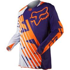 an orange and purple jersey with the fox logo on it