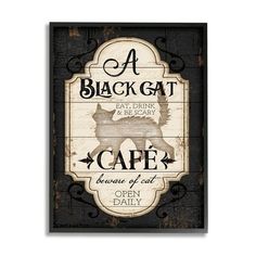 a wooden sign with an image of a cat on it's back and the words cafe open daily