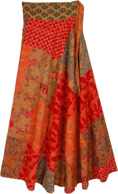 A classy bohemian reversible wrap-around skirt in bright shades of red and orange colors.  One side of the skirt has beautiful floral patchwork and the reverse side of the skirt has swirly waves print in complimenting colors. #tlb #WrapAroundSkirt #Patchwork #Floral #Printed #bohemianfashion #Handmade #reversibleskirt #patchworkskirt #wrapskirt #floralskirt Spring Red Patchwork Skirt, Red Patchwork Skirt For Spring, Bohemian Red Skirt With Patchwork, Red Bohemian Wrap Skirt For Summer, Bohemian Red Flowy Wrap Skirt, Red Bohemian Wrap Skirt, Complimenting Colors, Classy Bohemian, Reversible Wrap Skirt