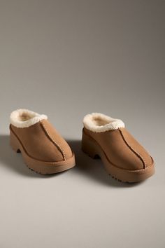 Suede upper Upcycled wool, lyocell insole EVA sole Slip-on styling Imported | New Heights Cozy Clogs by UGG in Beige, Women's, Size: 5, Wool/Lyocell/EVA at Anthropologie Comfortable Textured Clogs For Fall, Comfortable Winter Clogs With Textured Footbed, Comfortable Clogs With Textured Footbed For Winter, Winter Suede Clogs With Rubber Sole, Winter Comfortable Closed Toe Clogs, Winter Suede Clogs With Textured Footbed, Comfortable Closed Toe Winter Clogs, Winter Cozy Clogs With Cushioned Footbed, Cozy Winter Clogs With Cushioned Footbed