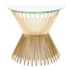 a glass table with wooden sticks on it and a round top in the middle, against a white background