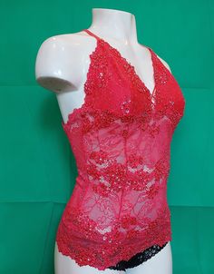 Lace cami top in dark pink color individually hand-decorated with matching sequins and beads. * Light in weight and comfortable to wear. * Available in 4 standard sizes (XS, S, M, and, L) * Made on stretch lace - for sizing convenience. * Has inner nylon lining around the bust area (not padded) to prevent transparency. * Hook-eye closure with 2 sizing options at the back for better fitting. * Ships in a couple of days from NY, USA * Free USPS First Class shipping within the US. Shipping upgrades Dark Pink Color, Lace Cami Top, Lace Cami, Pink Coral, Glam Dresses, Tank Top Cami, Hook Eye, Cami Tanks, Coral Color